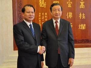 武文宁副总理会见中国国务院副总理马凯